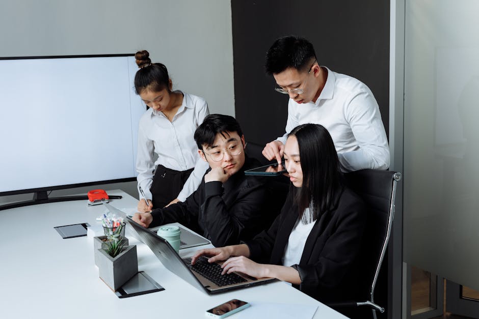 team using rolling TV cart for presentation