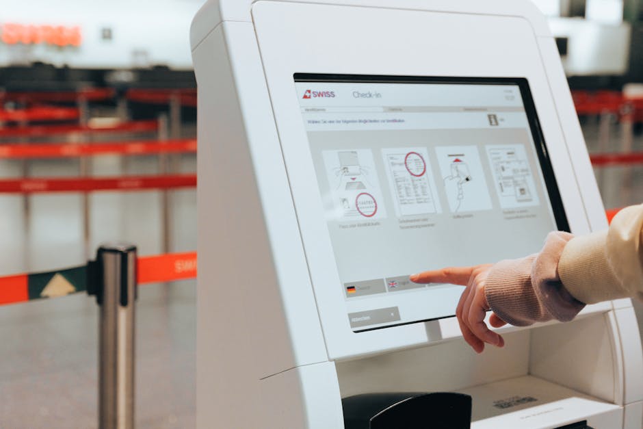 visitor using digital kiosk for check-in