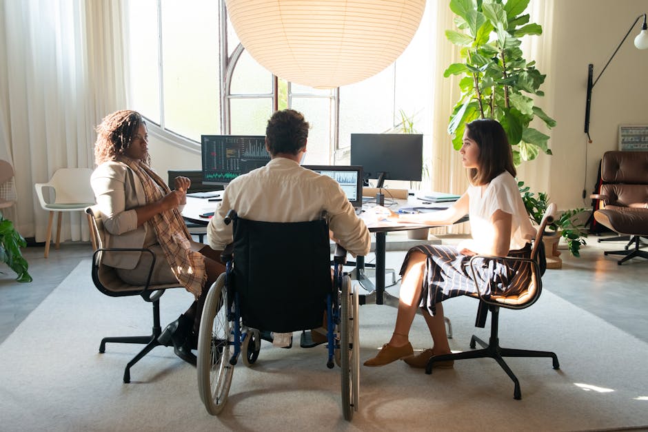 workplace meeting with accessibility features like captioning